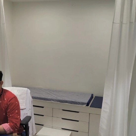Patient examination area — Actual clinic photograph